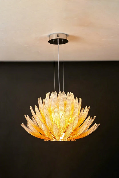 Helios Agave Glass Starburst Chandelier | Glass, Metal | Amber glass variant unlit against a black background, displaying the natural amber tint | Isolated shot | vexa lamps