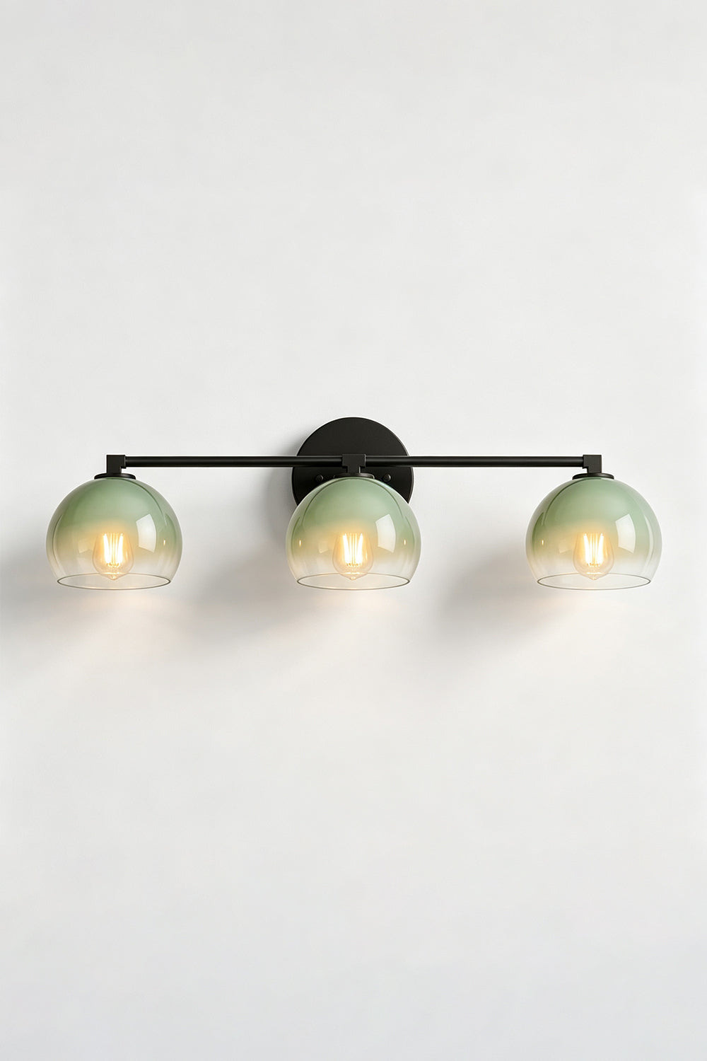 Alba Ombre Glass Wall Sconce with three hand-blown green to clear glass globes and iron bar.