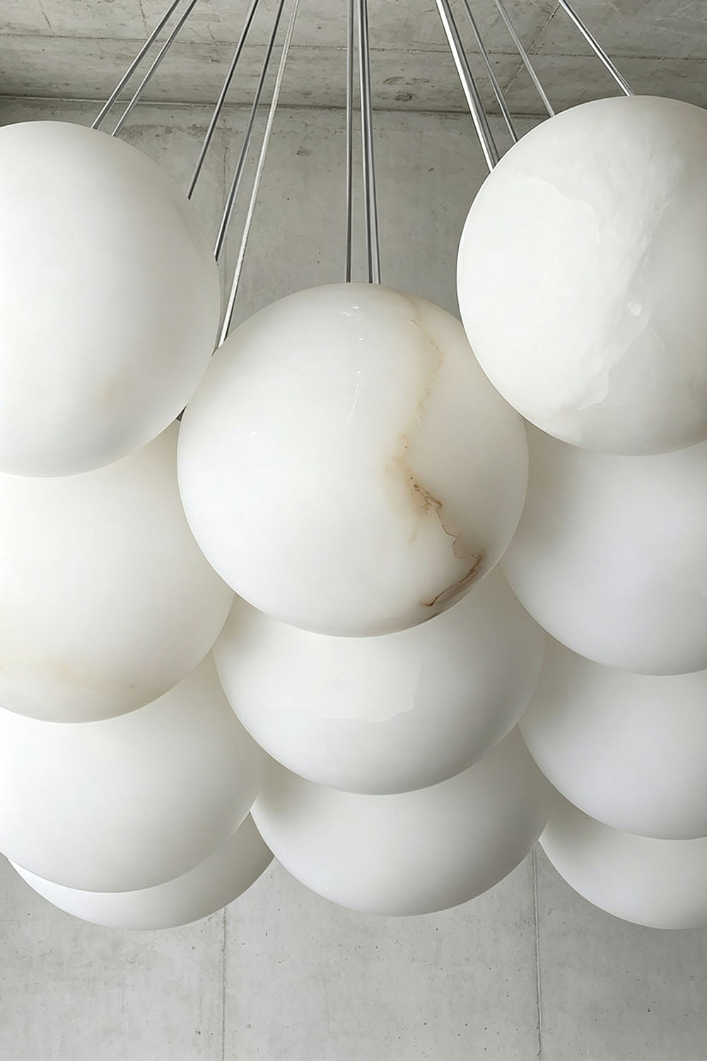 Amandine Alabaster Globe Cluster Pendant Light showcasing elegant clustered design with alabaster globe elements.