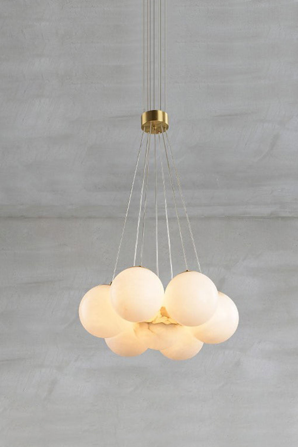 Amandine Alabaster Globe Cluster Pendant Light featuring elegant clustered alabaster globe design.