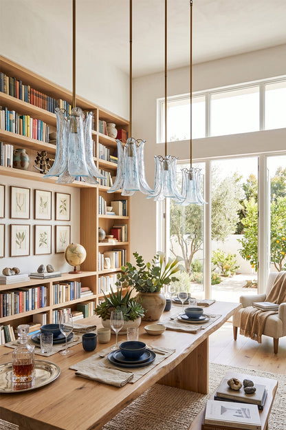 Arboreal Petal Glass Pendant Lamp illuminating a dining area with natural light and stylish decor.