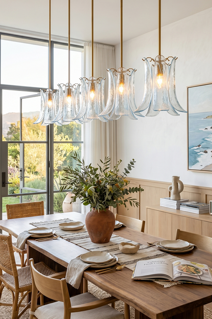 Arboreal Petal Glass Pendant Lamp elegantly illuminates a modern dining space with soft glowing light.