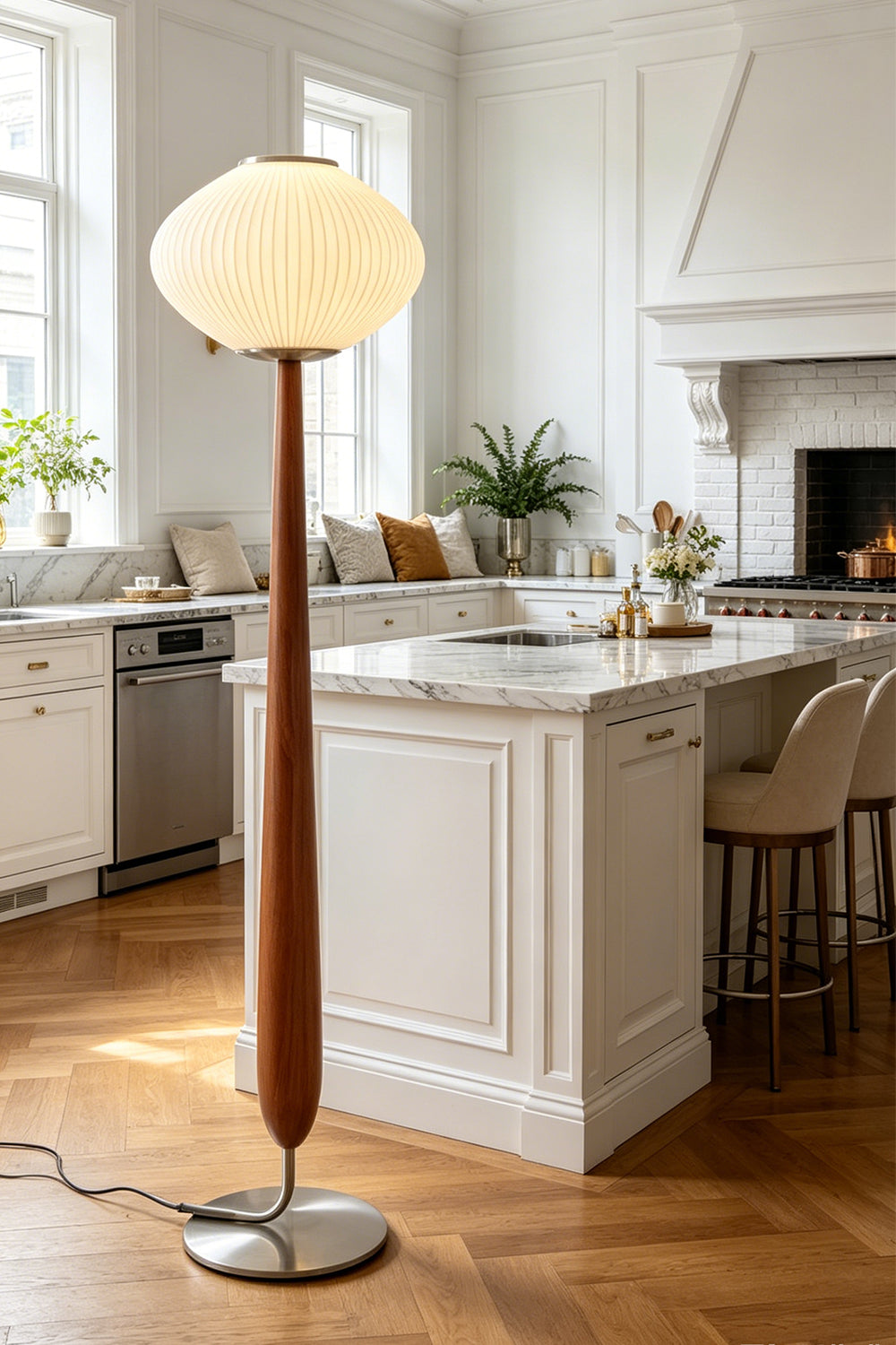 Arden Walnut Floor Lamp | Wood, Metal, Fabric | Staged as a stylish overhead light fixture in a modern open kitchen next to a classic white island counter with wood flooring | vexa lamps