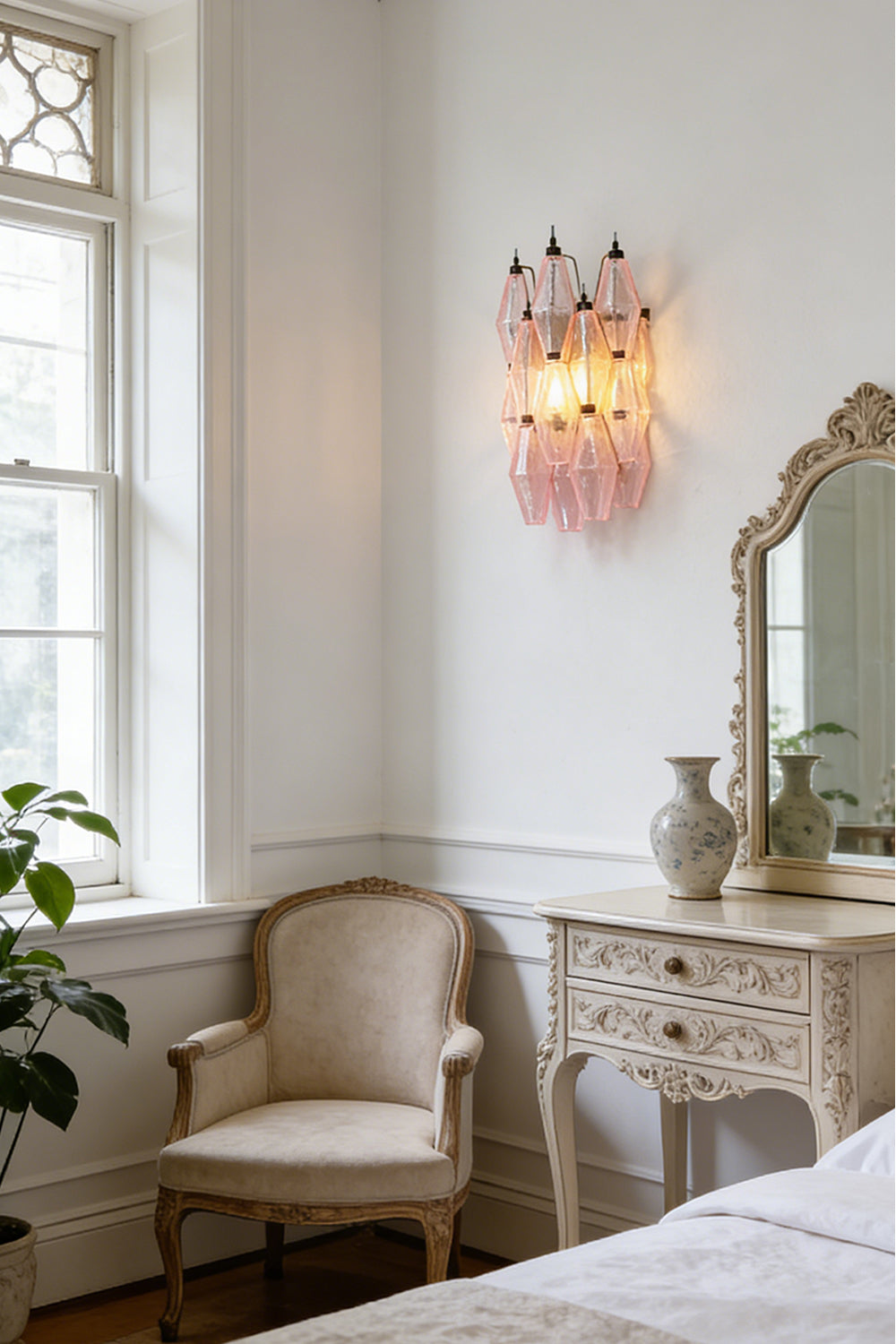 Lit pink polyhedral glass wall lamp | Metal, Glass | Bedroom interior scene next to a window | vexa lamps