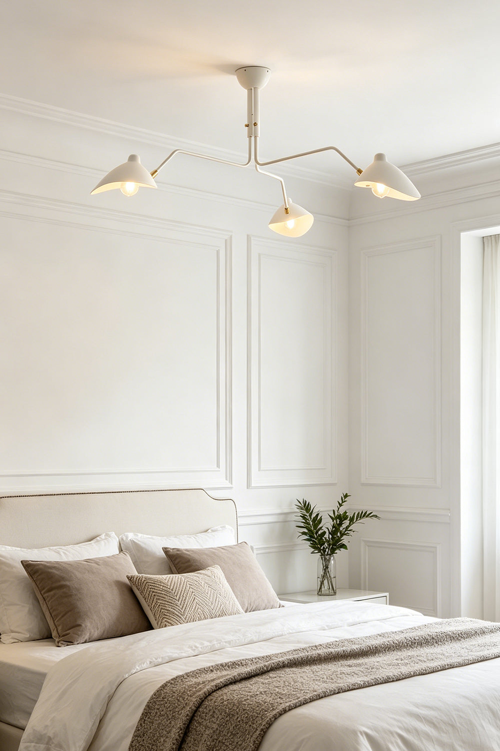 White 3-arm articulated spider ceiling light | Metal | Mounted in a minimalist bedroom above the bed | vexa lamps