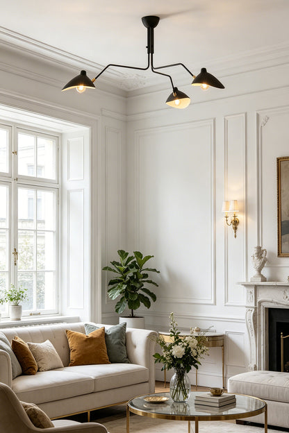 Modern black 3-arm multi arm spider ceiling lamp | Metal | Centered on a white paneled ceiling in a living room | vexa lamps