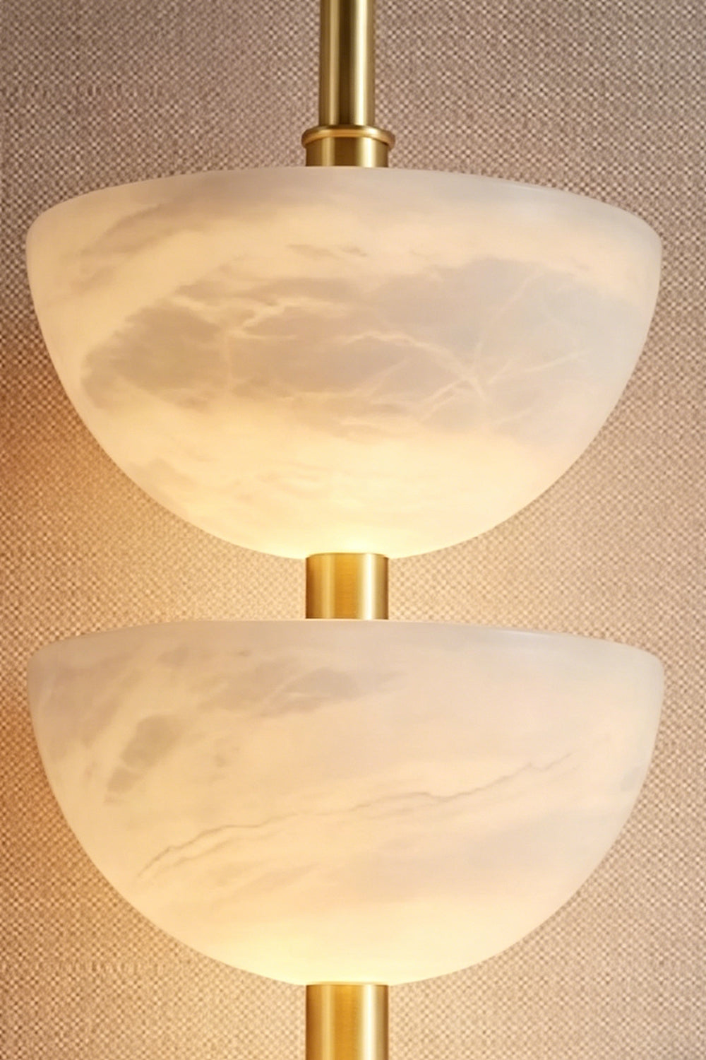 Ascendant Wall Lamp bowl detail | Alabaster | Close-up of lit stone texture and warm glow | vexa lamps