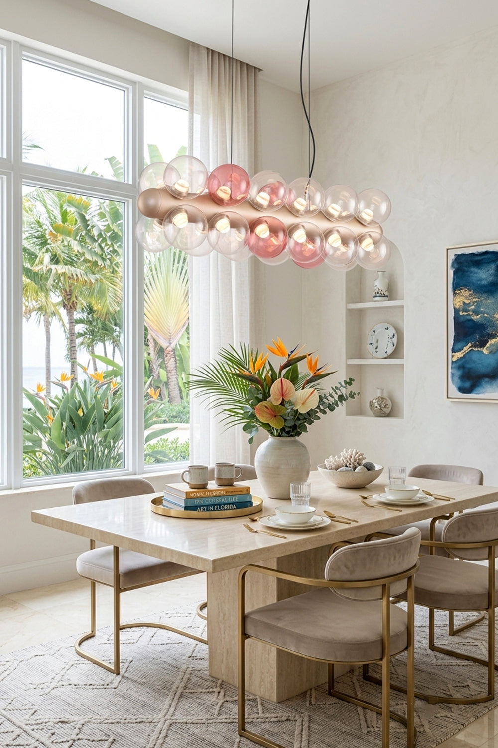 Astraea Linear Prismatic Globe Chandelier illuminating a modern dining room with elegant decor and lush greenery outside.