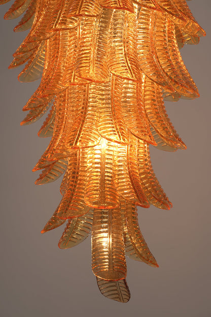 Aurelia Helix Amber Glass Cascade Chandelier showcasing amber glass plumes in a spiral design.