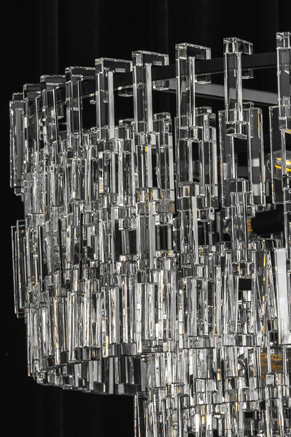 Aven Tiered Glass Prism Chandelier | Glass, Metal | Profile studio close-up of the unlit crystal chandelier highlighting the sparkle of clear glass against a dark background | vexa lamps