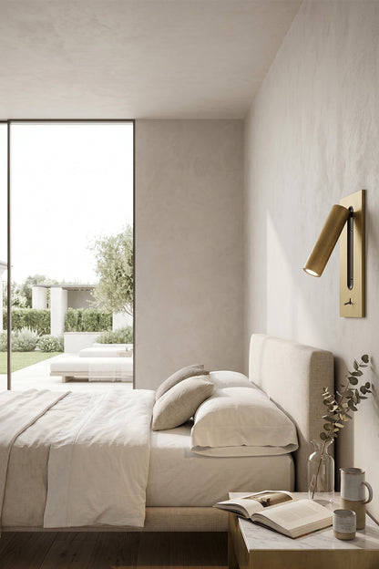 Axial Pivot Folding LED Wall Lamp illuminating a modern minimalist bedroom with a cozy bed and natural light.