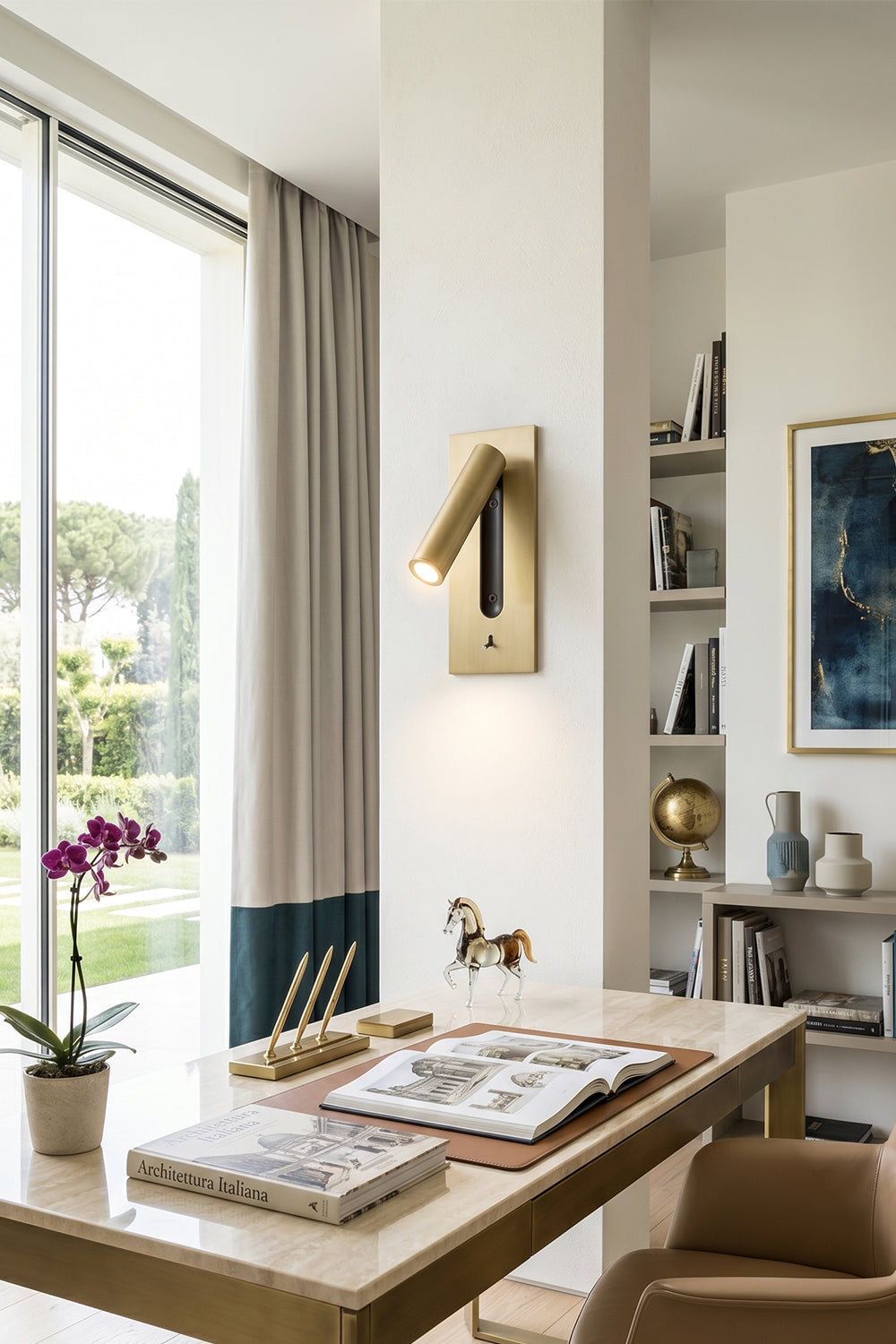 Axial Pivot Folding LED Wall Lamp illuminating a stylish home office with a modern design