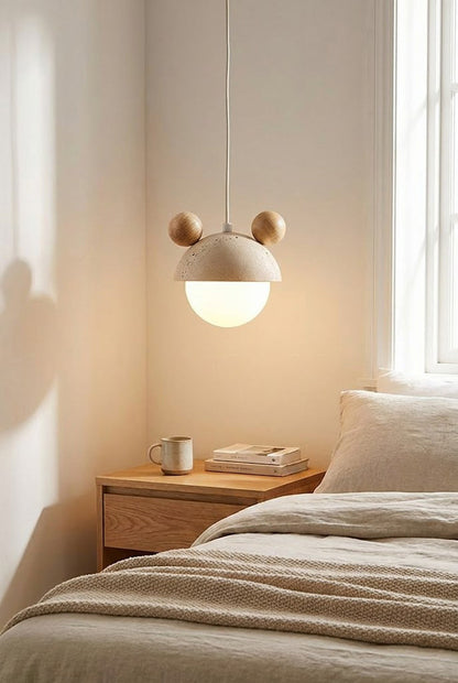 Whimsical bear ear pendant lamp | Travertine, Metal, Glass | Bedroom interior scene with neutral bedding | vexa lamps