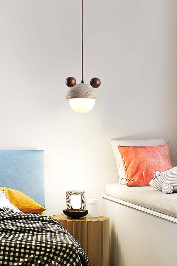 Bear ear travertine pendant light in a nursery | Travertine, Metal, Glass | Bedside scene with a Baymax plush toy | vexa lamps