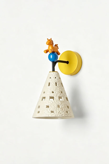 Carousel Horizon Ceramic Wall Sconce | Metal, Resin, Ceramics | Angled view of the illuminated sconce on a plain wall, highlighting its sculptural and playful form | Isolated shot | vexa lamps