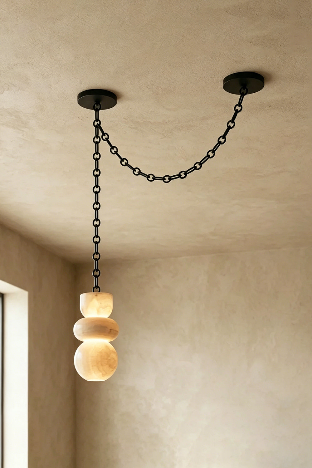Single Alabaster Pendant | Alabaster, Metal | Swag mount installation view on plain ceiling | vexa lamps