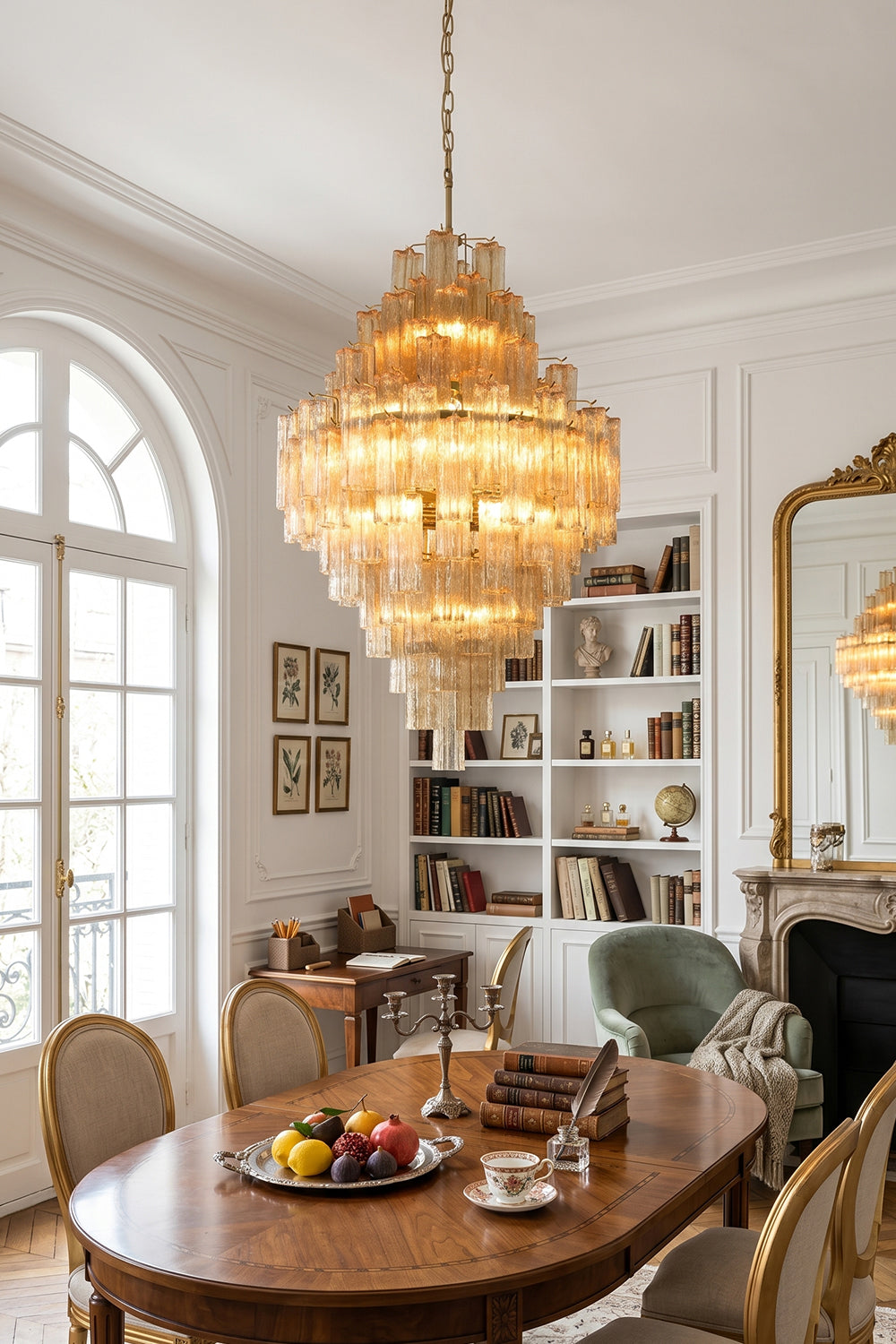Celestial Glass Cascade Chandelier illuminating a dining area with elegant decor and natural light.