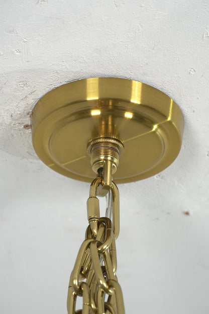 Celestial Glass Cascade Chandelier ceiling mount with gold finish and decorative chain connection.