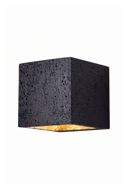 Celestial Tectonic Black Travertine Wall Lamp | Black Travertine | Cubic form, porous stone texture, gold leaf interior | Isolated on white | vexa lamps