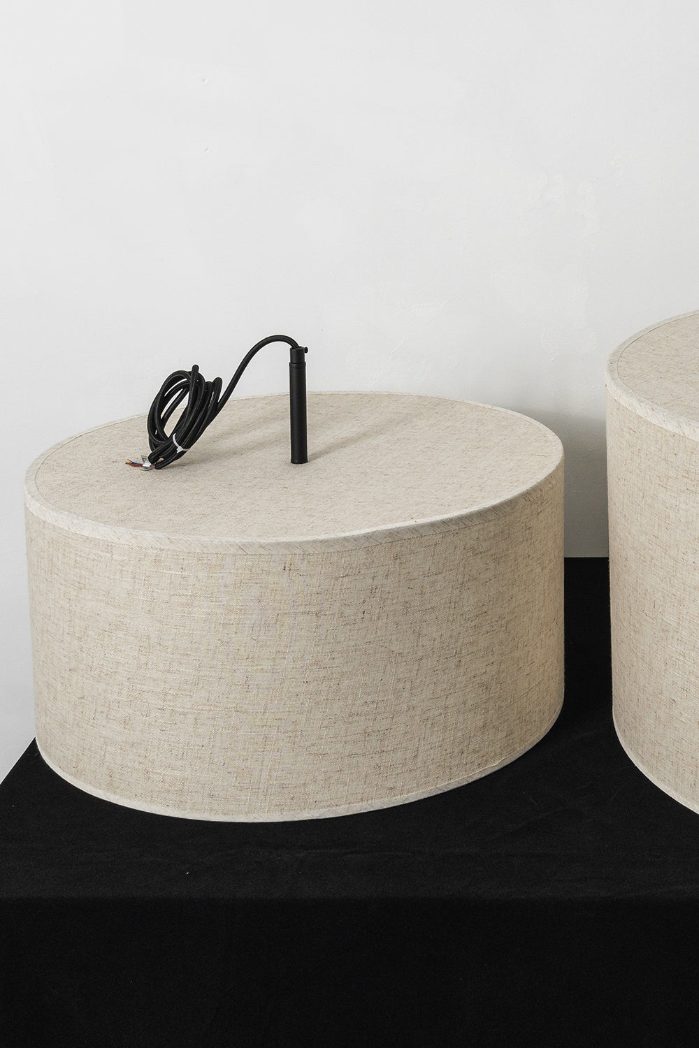 Concentric Veil Detail | Fabric | Close-up of the unlit fabric shade profile on a dark surface | vexa lamps