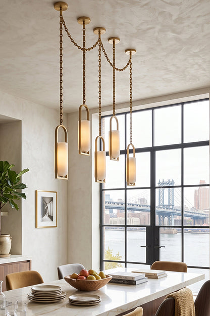 Cressida Alabaster Melange Chain Chandelier in modern dining area with river view and elegant decor.