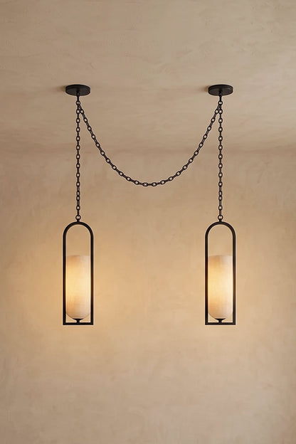 Cressida Alabaster Melange Chain Chandelier hanging from the ceiling in an upscale modern interior.