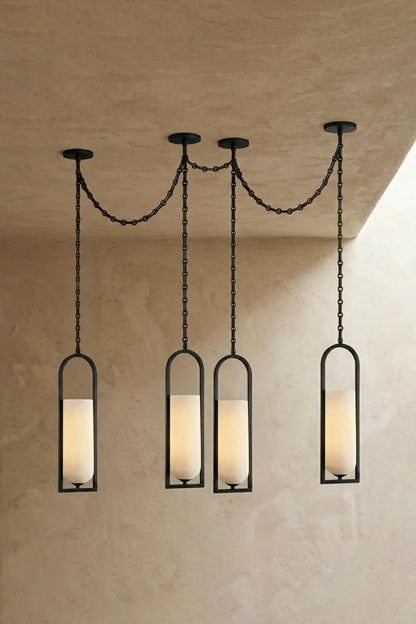 Cressida Alabaster Melange Chain Chandelier hanging from the ceiling in an upscale modern interior.