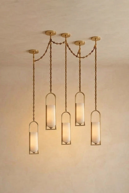 Cressida Alabaster Melange Chain Chandelier hanging from the ceiling in an upscale modern interior.