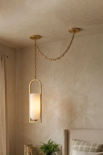 Cressida Alabaster Melange Chain Chandelier hanging from the ceiling in an upscale modern interior.