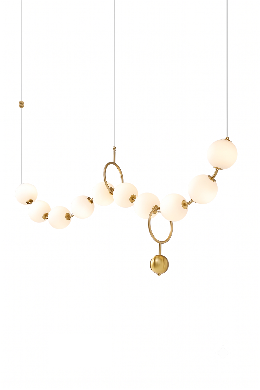 Delphine Pearl Strand Chandelier showcasing matte-white globes and brass accents, ideal for modern spaces.