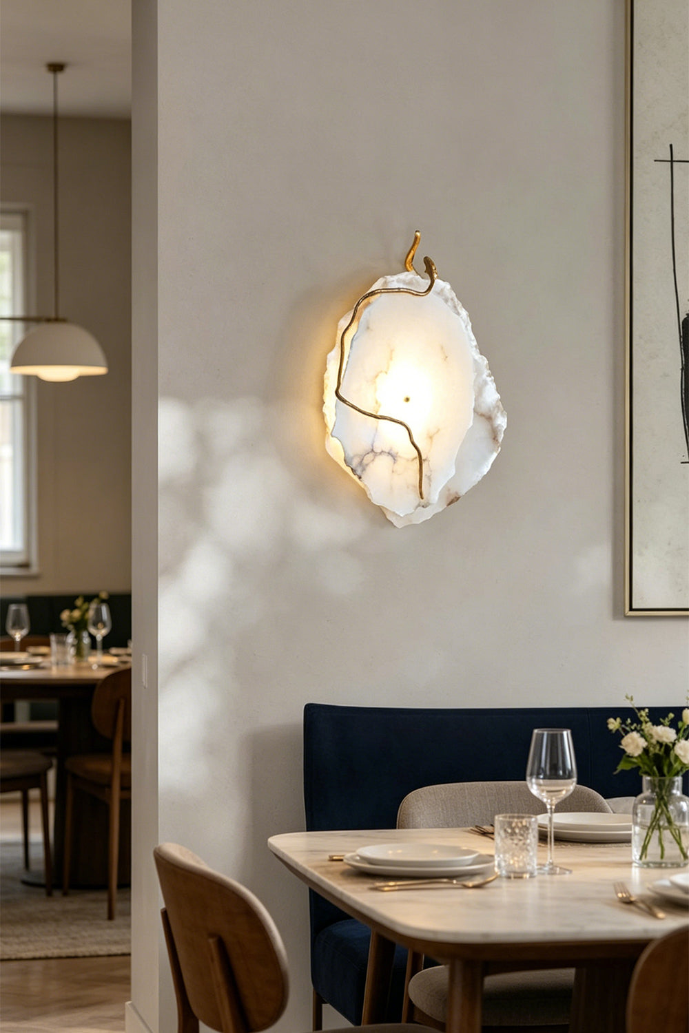 Double layer Arboreal Alabaster Wall Lamp illuminating a stylish dining area with elegant decor.