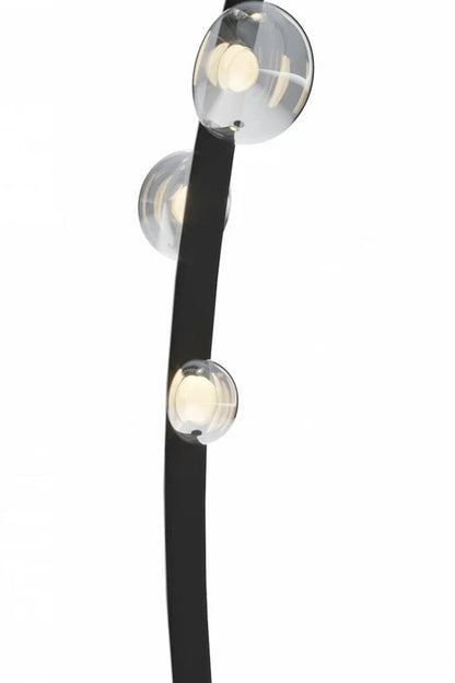 Drosia Dewdrop Floor Lamp | Glass, Metal | Vertical product shot focusing on the upper curved black iron stem and attached transparent glass bubble modules on a solid white backdrop | Detail shot | vexa lamps