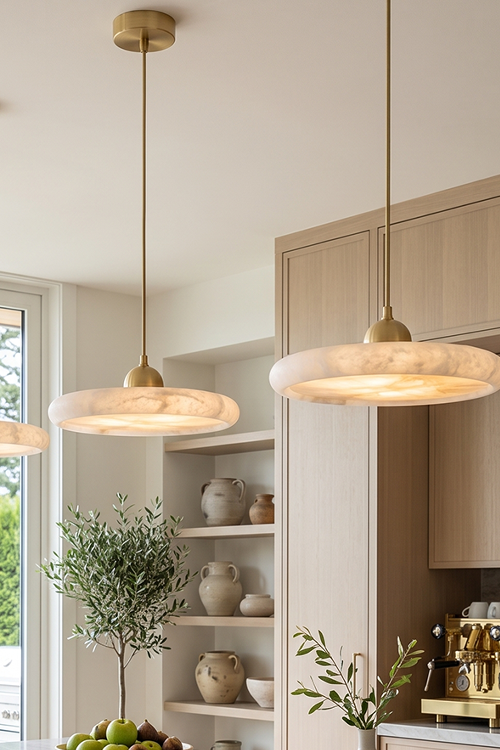 Elowen Alabaster Disc Pendant Light| Natural Alabaster and Brass | Multiple pendants lined up nicely to provide perfect illumination over a modern home kitchen bar area | vexa lamps
