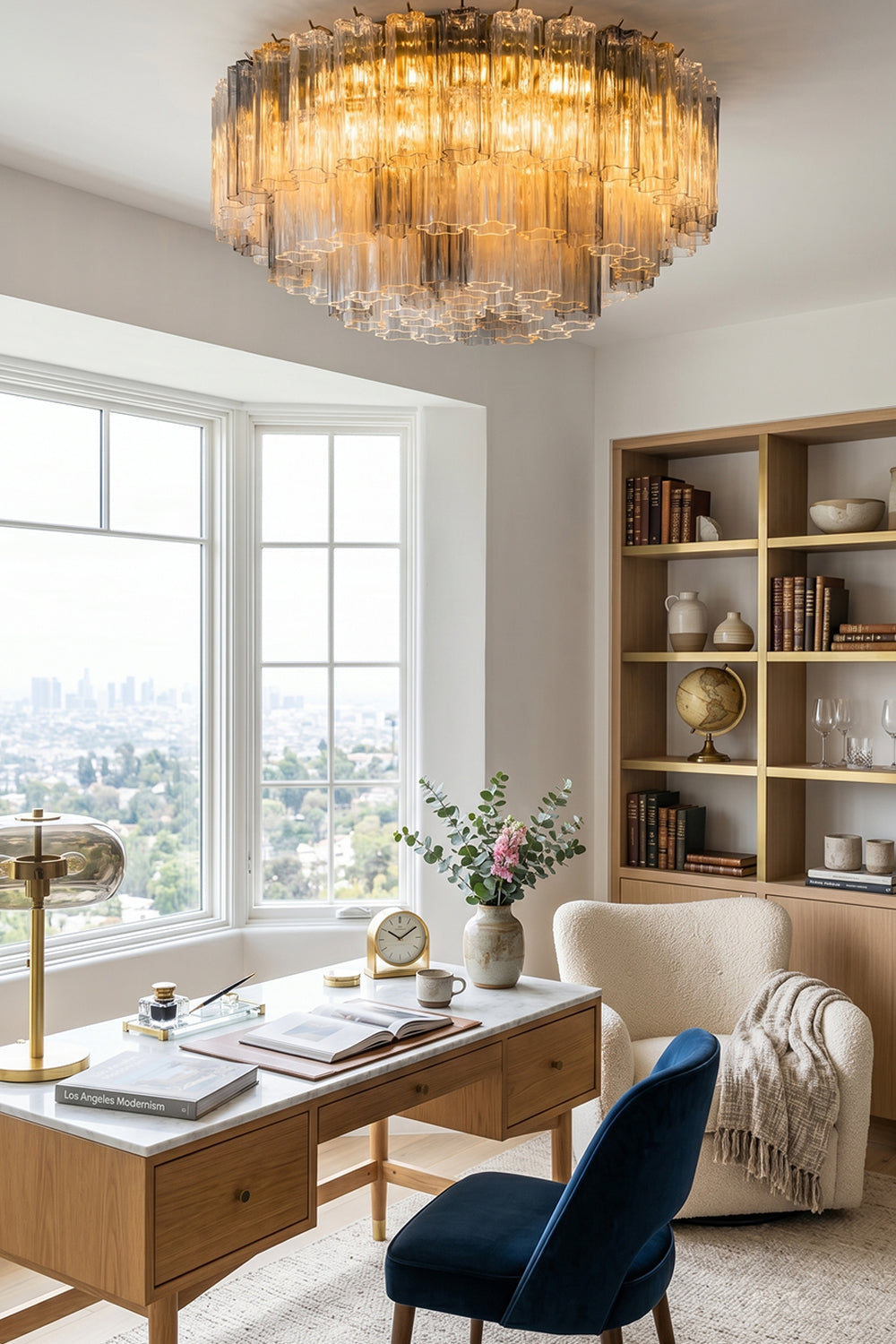 Elysian Tiered Fluted Ceiling Light | Glass, Metal | Illuminating a minimalist contemporary study area over a wooden writing desk paired with a dark blue velvet chair | vexa lamps