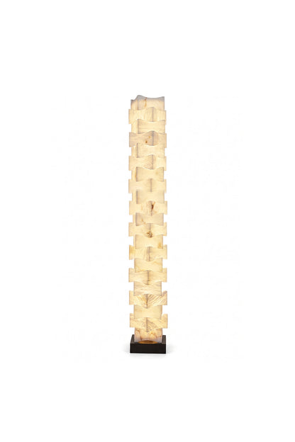 Ethereal Monolith Alabaster Floor Lamp | Lit, intricate stacked-block structure | Warm internal glow with marble veining | Square pillar form | Isolated on white | vexa lamps