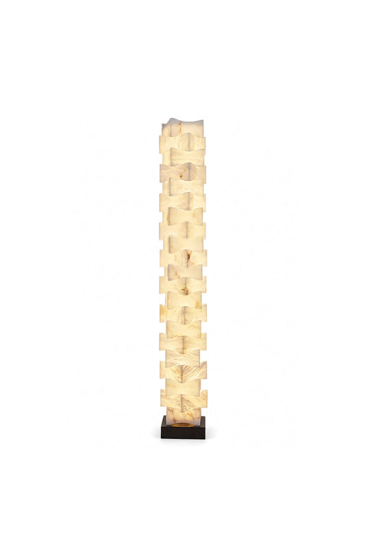Ethereal Monolith Alabaster Floor Lamp | Lit, intricate stacked-block structure | Warm internal glow with marble veining | Square pillar form | Isolated on white | vexa lamps