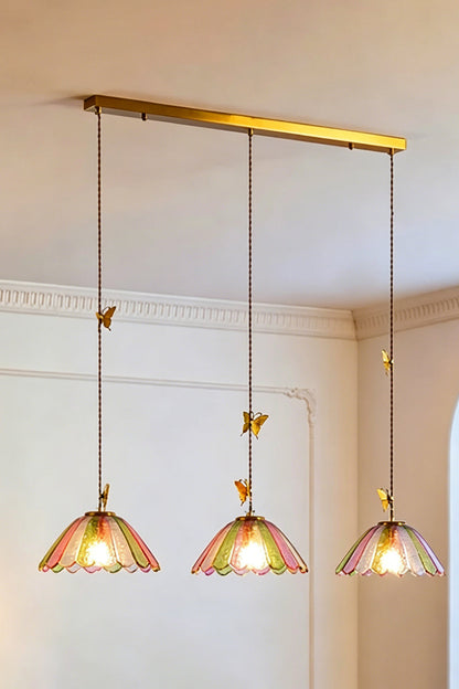 Faye Pastel Scalloped Glass Pendant Lamp | Glass, Metal | Full view of the 3-light linear variant suspended from a rectangular polished brass ceiling canopy plate | vexa lamps