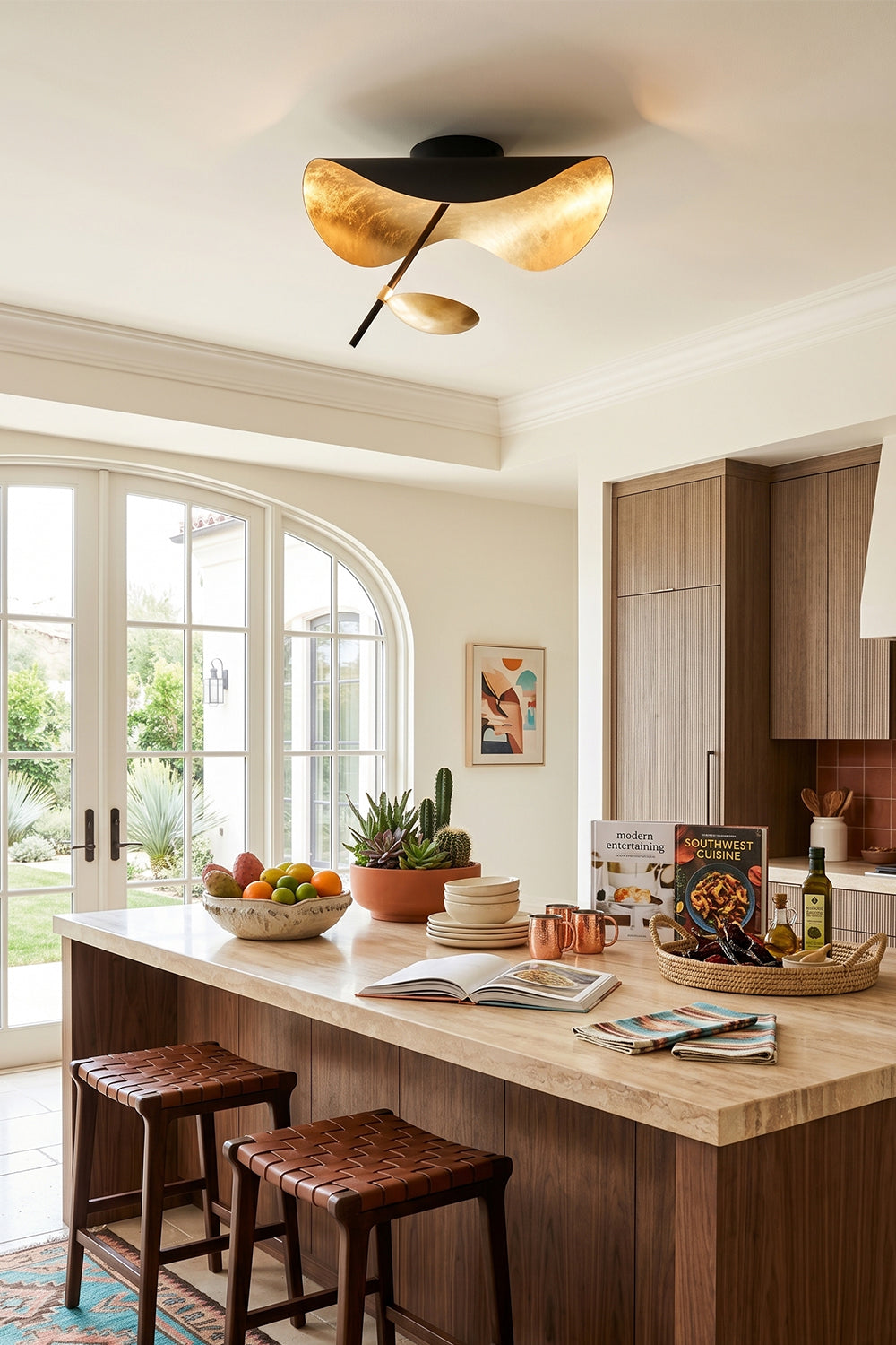 Gold-Tone Sculptural Ceiling Light illuminating a modern kitchen with wood and natural decor.