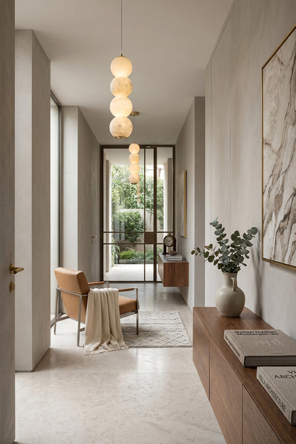 Imperial Epoch Alabaster Pendant Lamp | Metal, Alabaster | Series of pendants lighting up a long, bright modern corridor | vexa lamps