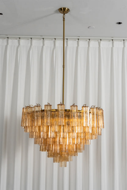 Isadora Tiered Amber Glass Chandelier with amber glass prisms and metallic downrod.