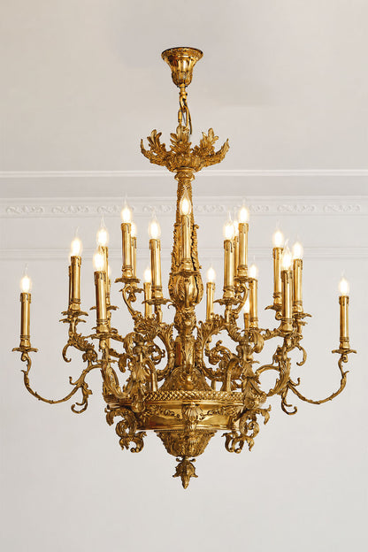 Percival Grand Brass Candelabra Chandelier showcasing intricate details and multiple candle-like lights in a classic design.