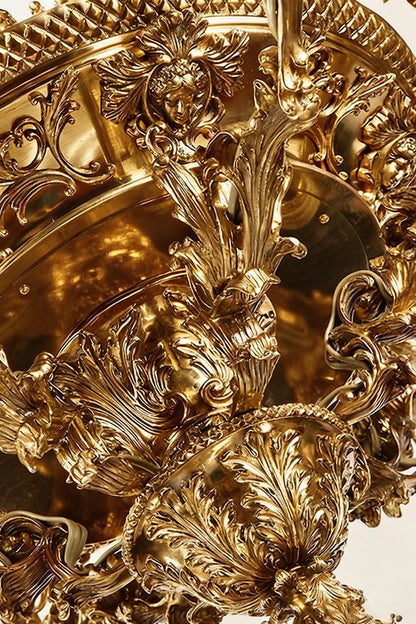 Close-up of the intricate details on the Percival Grand Brass Candelabra Chandelier, showcasing its ornate design.