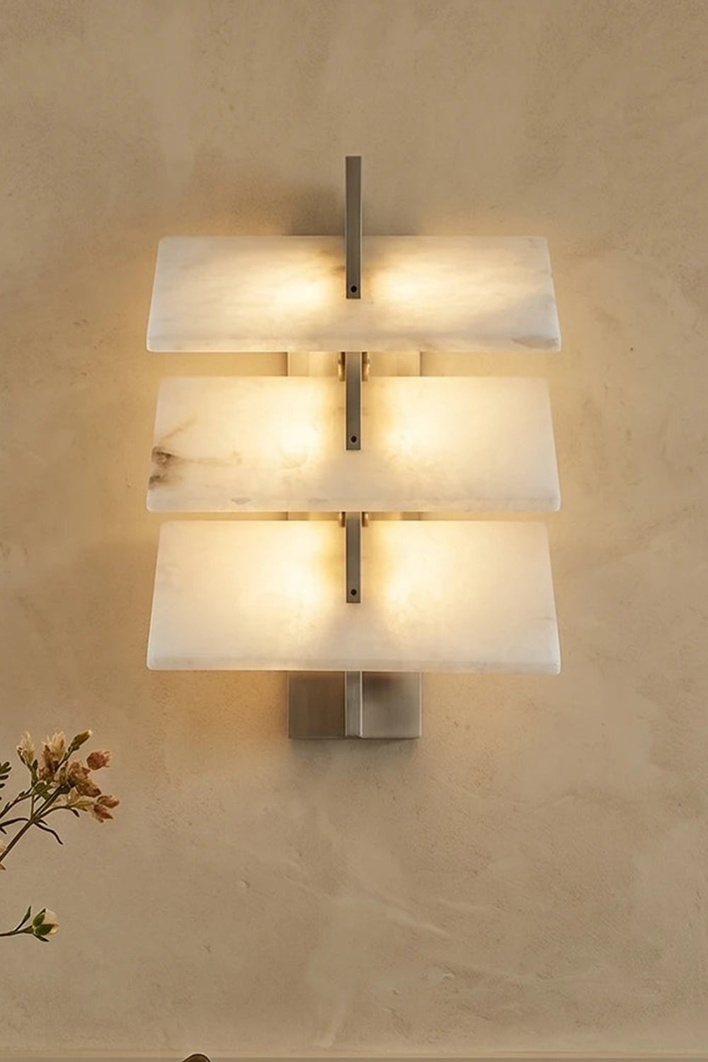 Isolde Tiered Alabaster Slab Wall Sconce featuring three stacked alabaster layers in brushed nickel frame.