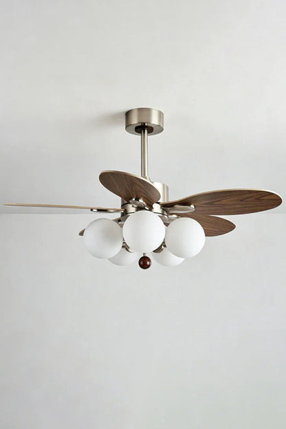 Keller Wooden Ceiling Fan Light | Wood, Glass, Metal | Alternative side studio view of the lit ceiling fan light combo unit against a clean light grey backdrop | vexa lamps
