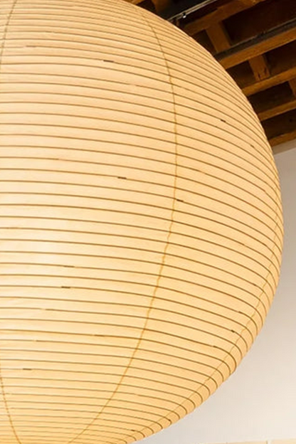 Komorebi Mulberry Paper Pendant Light | Paper, Bamboo | Close-up structural view of an unlit cream mulberry paper lantern highlighting the intricate horizontal bamboo ribs | Detail shot | vexa lamps