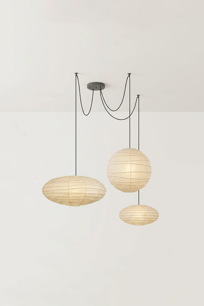 Komorebi Mulberry Paper Pendant Light | Paper, Bamboo | Studio view of an unlit 3-light multi-pendant arrangement showing two wide saucers and a central sphere | vexa lamps