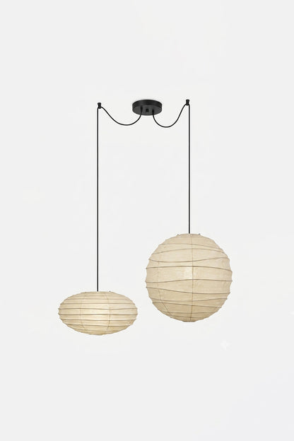 Komorebi Mulberry Paper Pendant Light | Paper, Bamboo | Studio view of a lit 2-light swag pendant combination featuring a wide saucer and a spherical paper lantern shade | vexa lamps