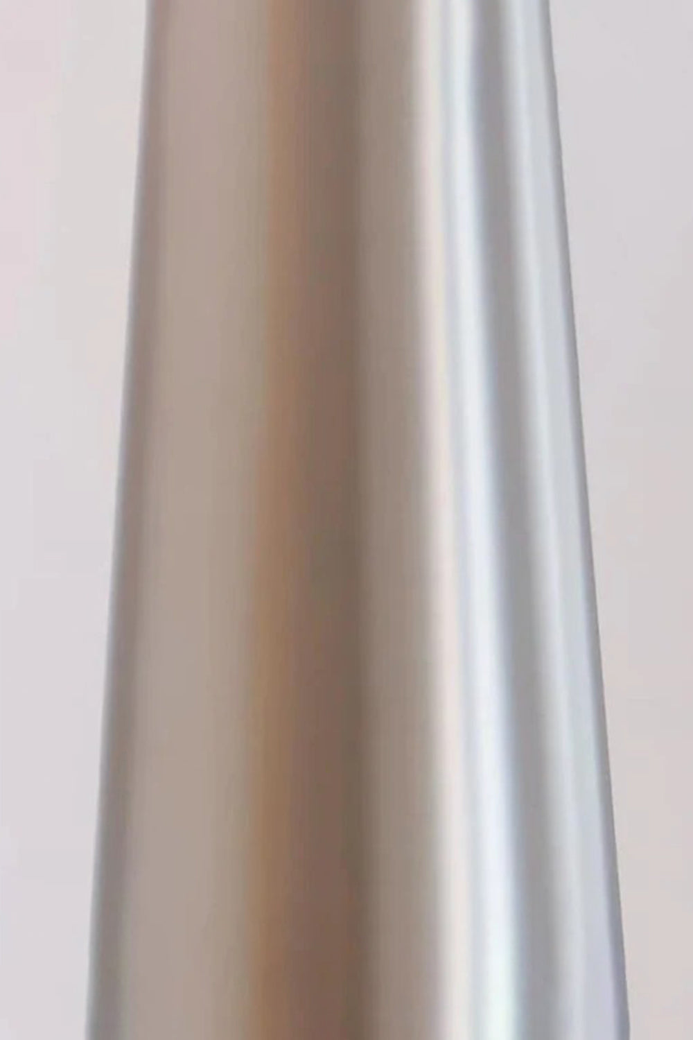 Lazuro Postmodern Cone Floor Light | Metal, Fabric | Macro close-up focus on the sleek brushed chrome silver finish of the tall tapered cone metal stem | Detail shot | vexa lamps
