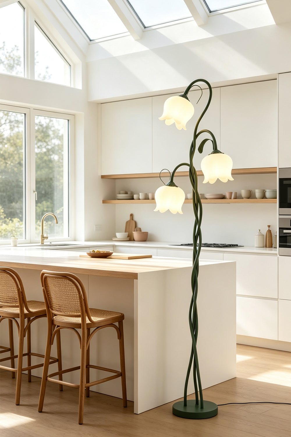 Linnea Tulip Bloom Floor Lamp | Glass and Green Metal | Displayed next to a modern kitchen island with wooden bar stools | vexa lamps