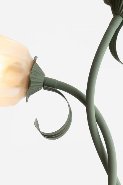 Linnea Tulip Bloom Floor Lamp | Glass and Green Metal | Detail shot showing a frosted glass tulip shade and curved vine-like green stem | vexa lamps